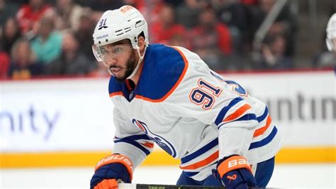 Oilers' Kane alleges man spat on his vehicle, used racist remark.